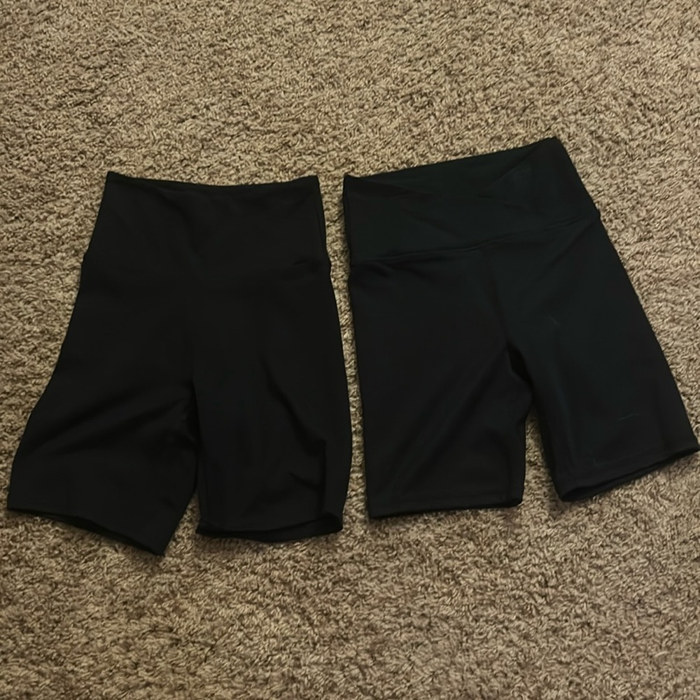 2 pairs black biker shorts, balance collection, one crossover waist one normal.